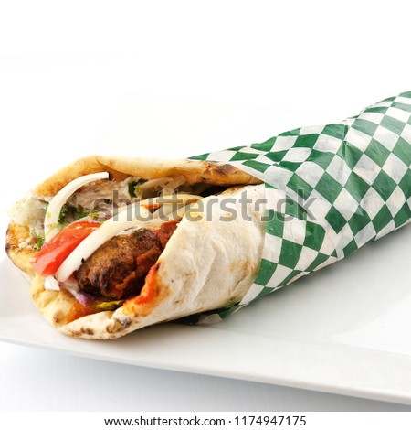 Chicken Kabab Wrap Royalty-Free Stock Photo #1174947175