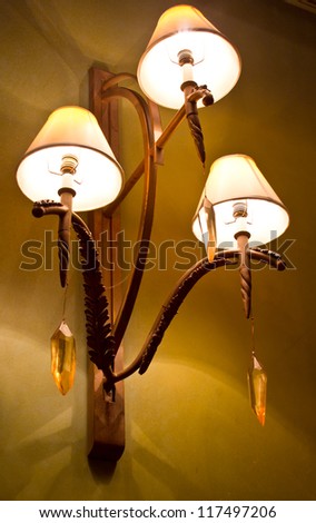 antique Lamps on a wall Royalty-Free Stock Photo #117497206