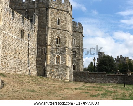 Windsor Castle in the historic town of Windsor on the River Thames, a residence of the British Royal Family, a venue for hosting state visits and a popular English tourist attraction