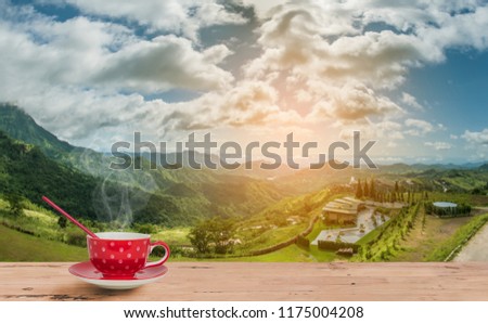Morning coffee at the mountain viewpoint. At sunrise
