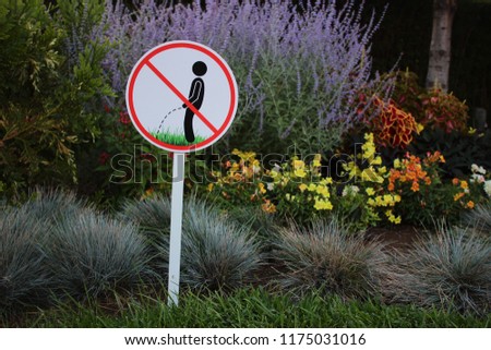 No pissing sign in the garden