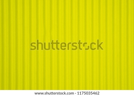 Yellow corrugated paper texture, use for background. vivid colour with copy space for add text or object.