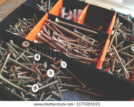 Box with nails, screws and another instruments