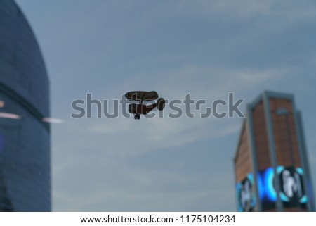Aircraft picture on the window in the Moscow City bulding. This is the new modern business buiding 