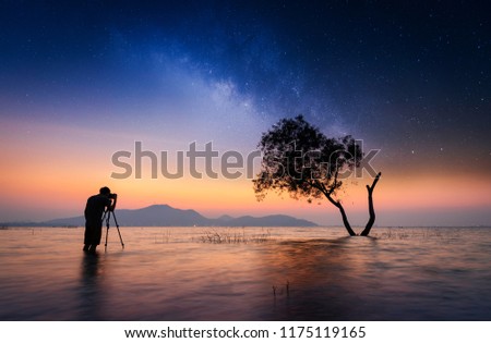 Milky Way with silhouette of photographer