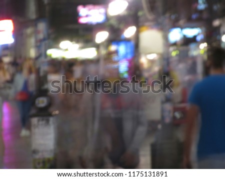 Sale Shopping. Blured peoples on the street. Foot. Motion blured people. Slow shutter speed. Bokeh, peoples in shopping. blur abstract people background, unrecognizable silhouettes of people