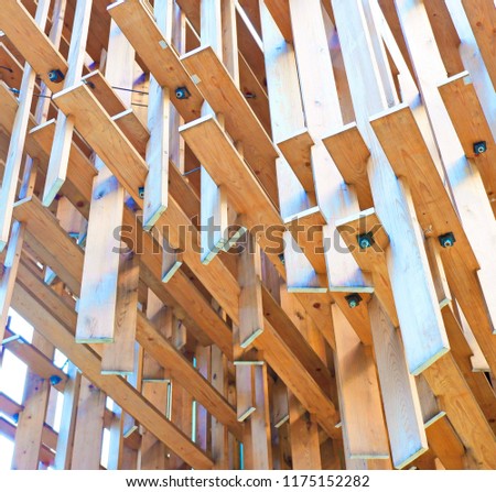 WOOD BARS CONCEPT STRUCTURE WITH    METAL PINS AND BOLTS JOINERY