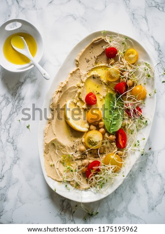 Hummus and vegetables. Mediterranean appetizer party idea