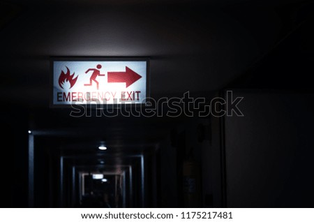Fire escape label light in hotel at night