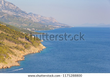 View of the shores of the Adriatic Sea and the Biokovo Mountains in the background in Croatia