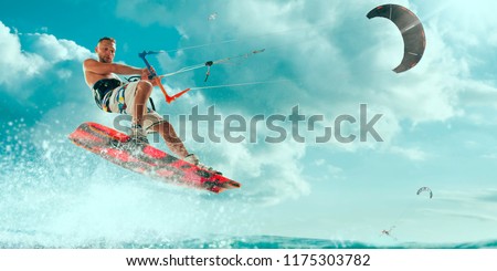 Kitesurfing. Man rides a kite Royalty-Free Stock Photo #1175303782