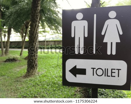 man woman toilet