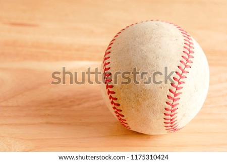 Sports Equipment old Baseball on wood background