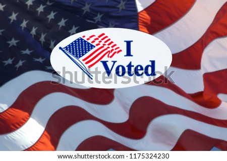 'I Voted' stickers on the US flag background.