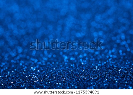Blue glitter. Shiny blue abstract christmas background.