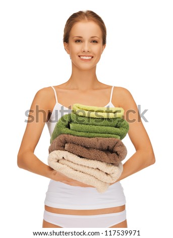 bright picture of lovely woman with towels.