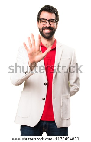Brunette man with glasses counting five on white background