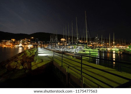 Beautiful night bay in Europe with yachts