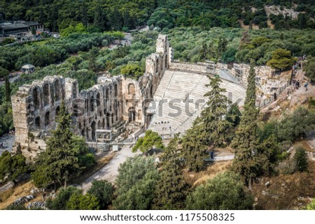 Odeon of Herodes Atticus at Acropolis, Athens, Greece. It is one of main landmarks of Athens. Scenic view of classical theater from above. Landscape with famous ancient Greek ruins in Athens center.