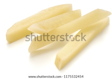 Raw Potato sliced strips prepared for French fries isolated on white background