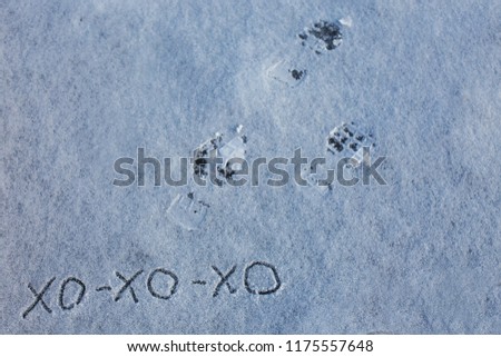 inscription on the snow is "ho-ho-ho" in Ukrainian and traces of Santa Claus.