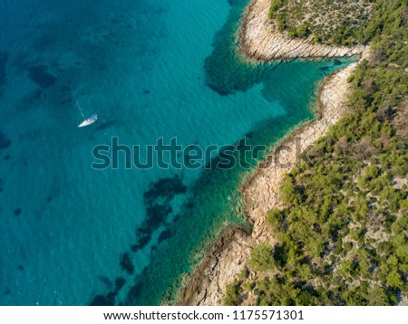 Aerial view of the turquoise water in Thasos, Greece.