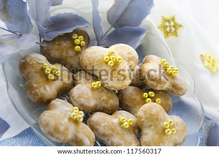 Glace little gignerbreads with golden sugar pearls