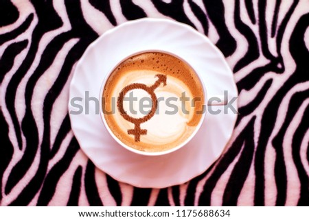 symbol of gender equality on milk foam coffee cups cappuccino