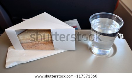 Airplane meal Royalty-Free Stock Photo #117571360