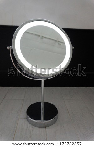 Silver LED Light Makeup Mirror isolated on Room