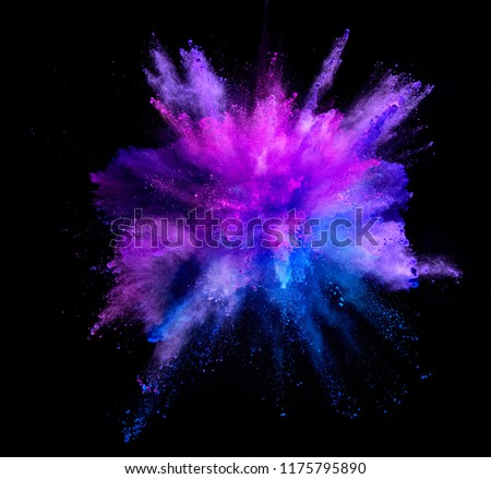 Explosion of coloured powder isolated on black background. Abstract colored background Royalty-Free Stock Photo #1175795890