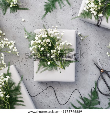 Christmas wrapping gifts, florist workshop, photo set. Flat lay, top view. The concept of New Year Holidays.