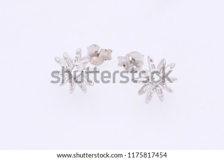 Fashion earring on white background