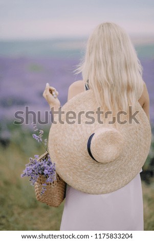 girl in a hat on a lavender field