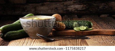 Polish cucumber soup with fresh cucumber and potatoes.