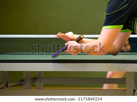 Table Tennis Player serving