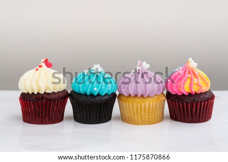 variety colorful cute cupcake on white background