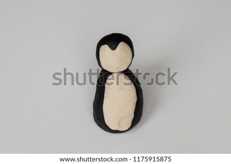 step by step making penguin with play dough for children's activity. school,nursery or kindergarten lesson plasticine concept.