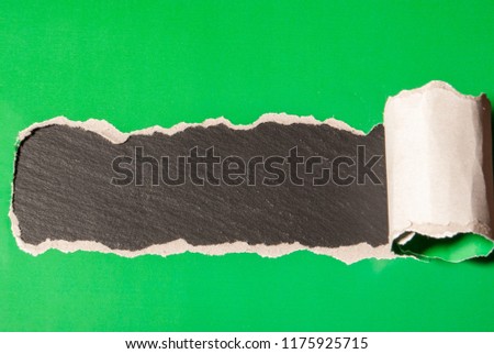 torn off green paper strip - background