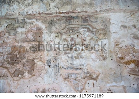 Bas-relief on the wall of the palace in Palenque, Mexico.