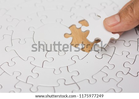 Jigsaw with one piece missing revealing,Comparative concept