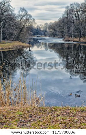 Saint Petersburg, Russia. A lonely fisherman on the pond of Yelagin Island.