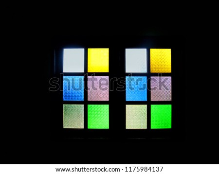 Stained glass window pane,Image of a multicolored stained glass window with block pattern, square format.