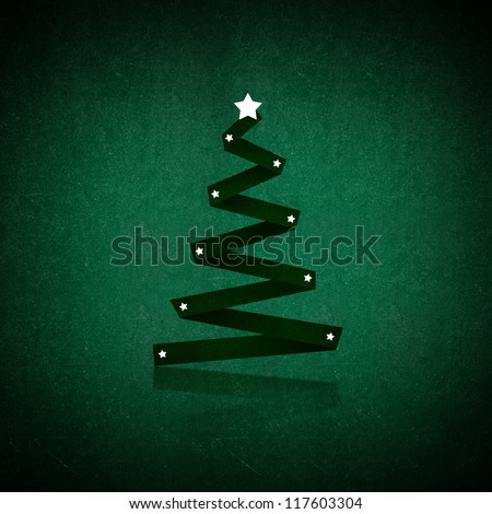 Christmas tree on a chalkboard background; holidays season conceptual image.