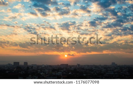 Picture for background of twilight sky above the city landscape in the morning sunrise time.