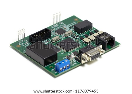 Electronic printed circuit board with chips and other components, green color, front side, angled view, isolated on white background Royalty-Free Stock Photo #1176079453