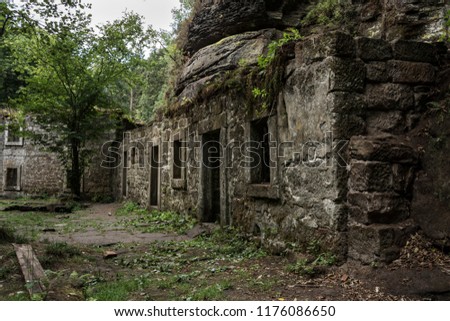  Old building. Ruin of an old mill building.  Royalty-Free Stock Photo #1176086650