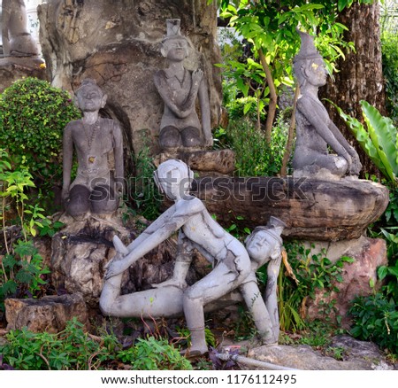 Hermit statues showing a posture of massage therapy at Wat Pho Temple, Bangkok, Thailand. Royalty-Free Stock Photo #1176112495
