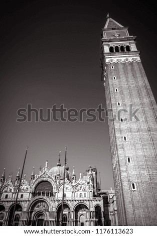 St Mark's Basilica and Campanile, Venice, Italy. Vertical view of main square of Venice in black and white. Landmark of Venice for background with copy space. Famous Renaissance buildings of Venice.