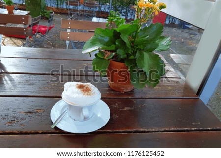 Top view cup of black coffee on a simple wooden table
Focus of the image so wanted.